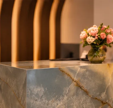The marble reception desk at Pamper Valley Spa